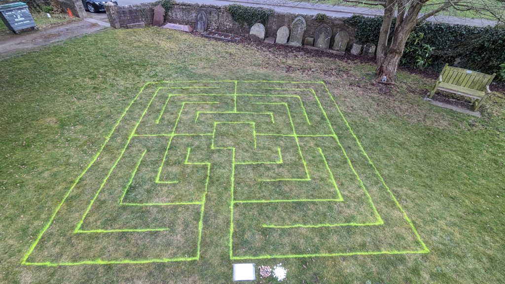 square labyrinth design painted onto grass in Clowne churchyard 